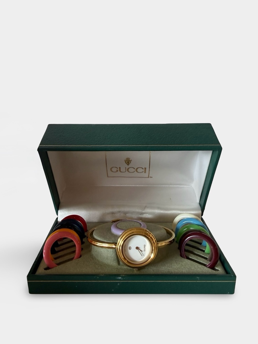 Gucci Gold Bangle Watch with Interchangeable Colorful Bezels